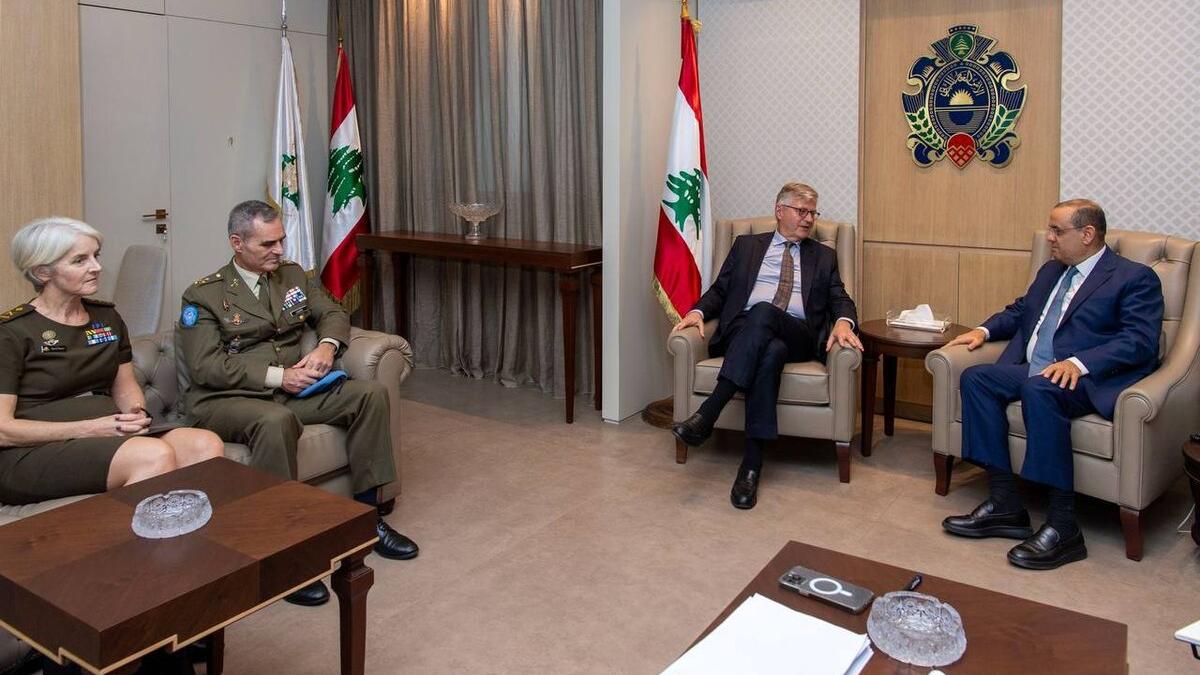 High level representatives attend a meeting.