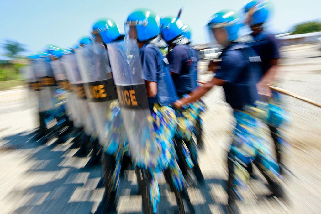 PNTL Rapid Intervention Unit and the Bangladeshi Formed Police Unit carry out tactical training exercise at the Tasi-tolu shooting range in Dili