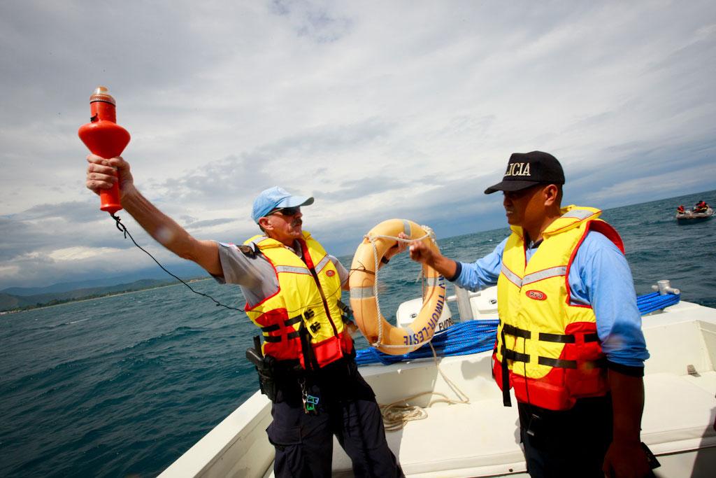 PNTL and UN Police officers with the Maritime Policing Unit run through search and rescue drills