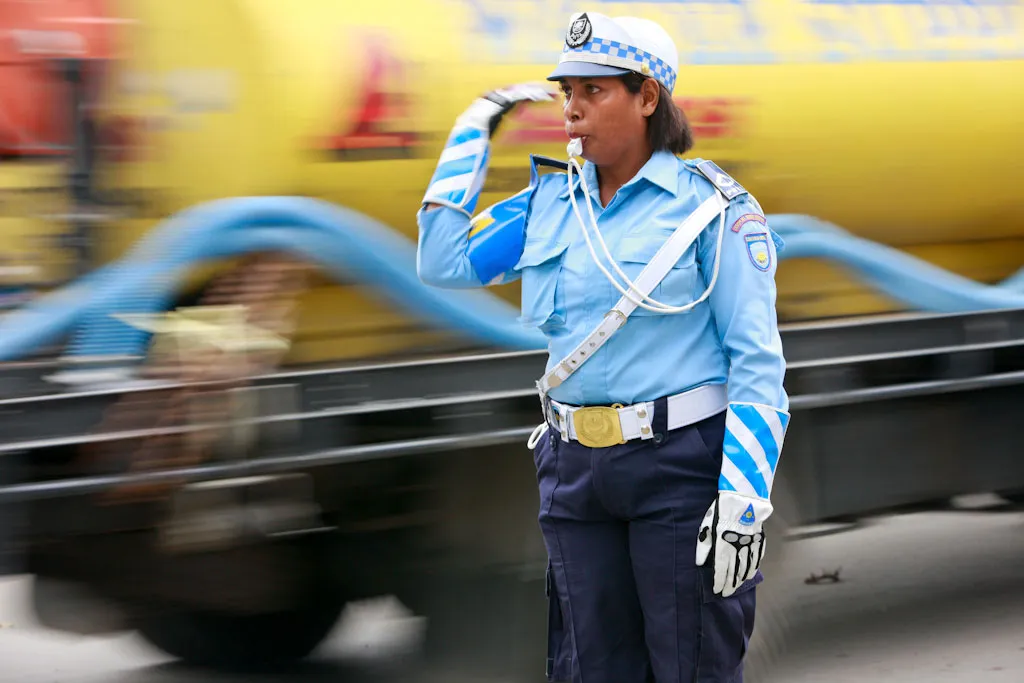 PNTL officer directs traffic in Dili