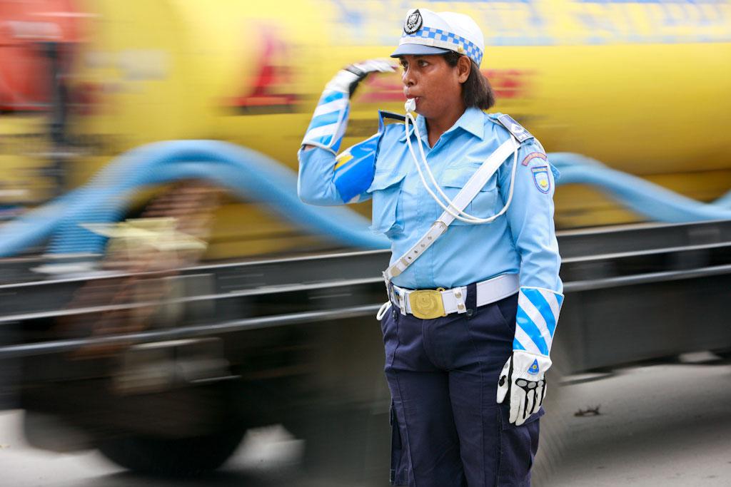 PNTL officer directs traffic in Dili