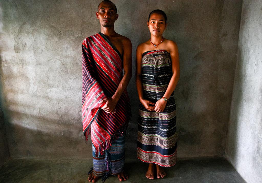 A man and a woman from Tutuala wear traditional tais weavings