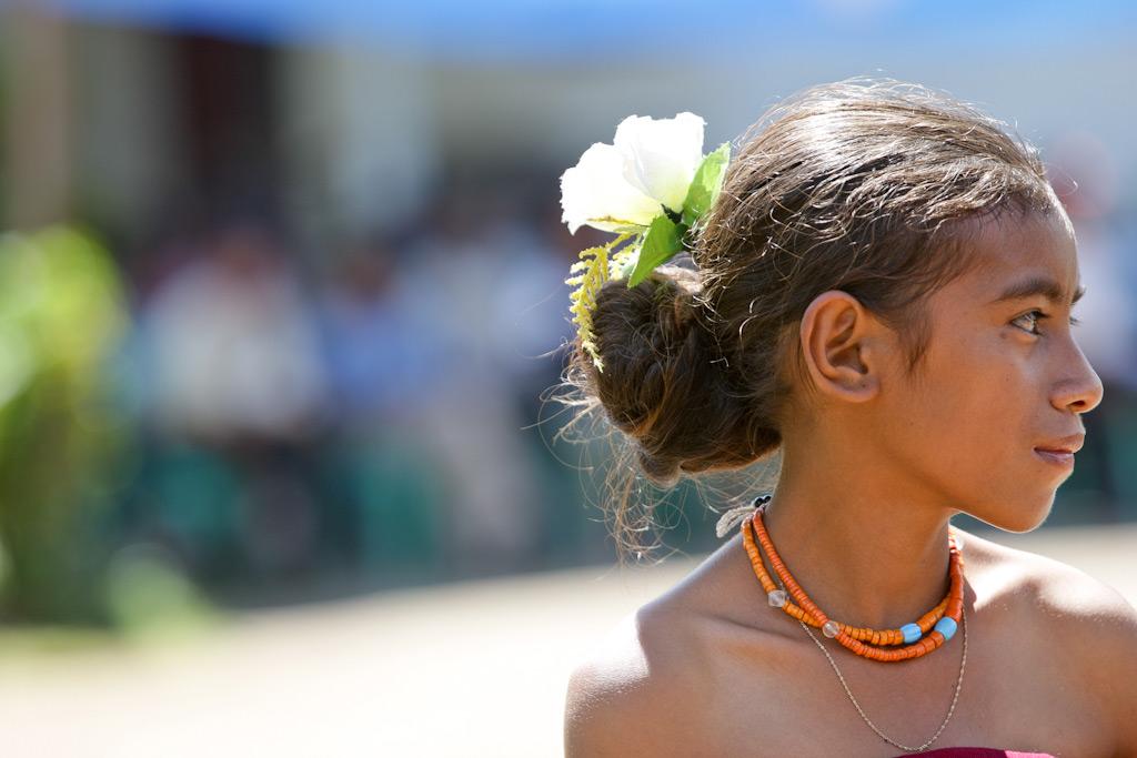 Woman participates in a traditional ceremony in Lospalos