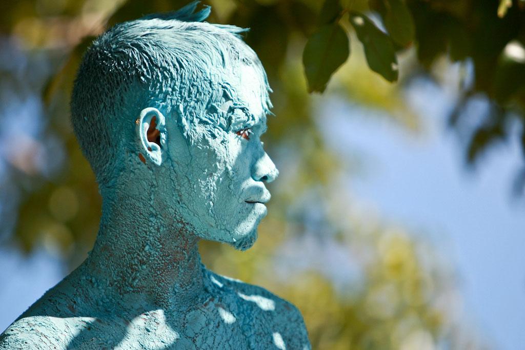 At a ceremony marking the resumption of primary policing responsibility by the Polícia Nacional de Timor-Leste (PNTL) in Manatuto, a young boy from a local art group wears blue paint