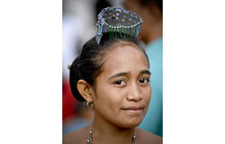 A young woman from Viqueque wears a traditional crown, ''Ulu-Suku''. Photo by Bernardino Soares/UNMI